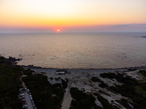 Aerial view of the sunset on the beaches of Rena Majore and Matteu
