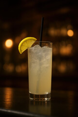 Tom Collins cocktail with lemon