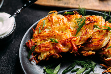 Golden Potato Pancakes with Sour Cream . draniki