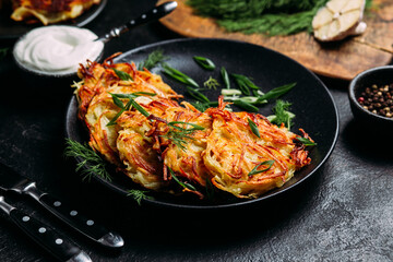 Golden Potato Pancakes with Sour Cream . draniki