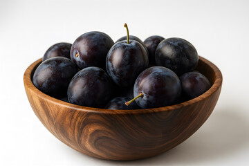 Fototapeta premium Close Up of Plums in Wooden Bowl on White Background Fresh Juicy Fruit Perfect for Healthy Eating