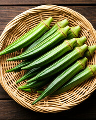 Fresh green ladyfinger on basket