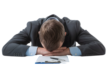 Stressed businessman with head down on desk isolated on transparent background