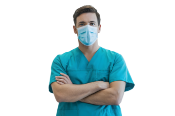 Young doctor in blue scrubs and mask with arms crossed isolated on transparent background
