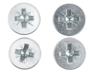 Close-Up of Four Phillips Head Screws Isolated on White Background