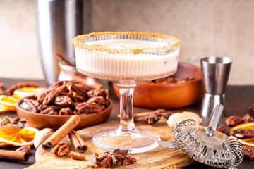 Pecan alcoholic cocktail, tasty autumn winter pecan pie martini, creamy alcohol drink, candied spiced old fashioned maple pecan cocktail with sweet liquor