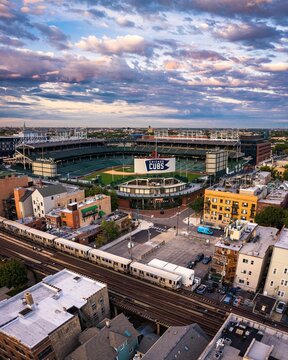 Aerial View of Wrigley Field in Chicago at Sunset with L Train Tracks