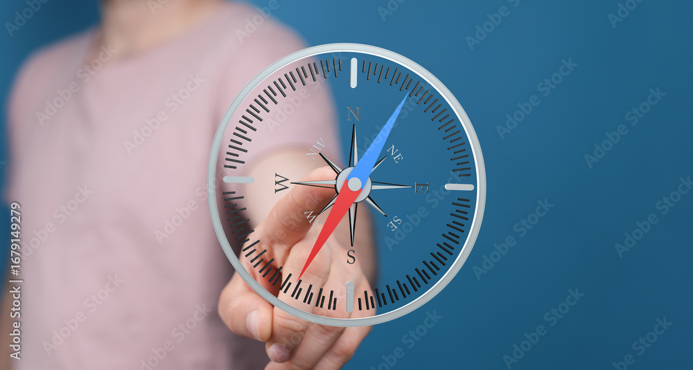 Aufkleber hand interacting with a virtual compass. find your way. navigation concept.