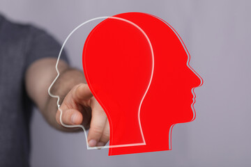 Abstract image depicting two heads, symbolizing different viewpoints or perspectives. Ideal for...