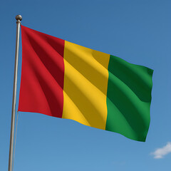 Guinea flag waving in the bright blue sky.