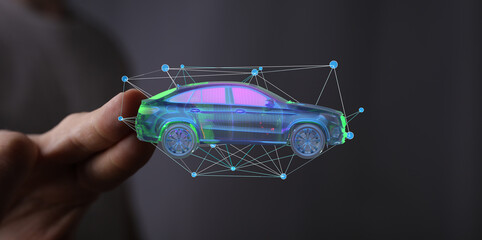 Futuristic concept.  Digital car model on finger, showcasing automotive technology and innovation.