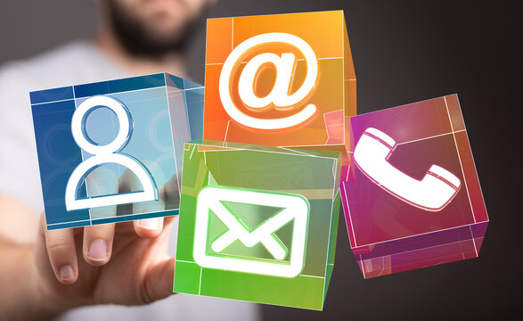 Modern contact methods.  Email, phone, and social media icons on colorful cubes.