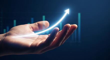Glowing upward arrow rests on open hand, against blurred graph background, symbolizing growth, success, and positive progress in business