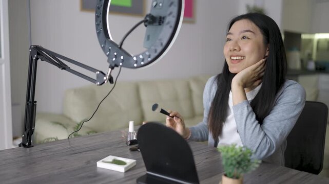 Thai Beauty Vlogger Recording Skincare Tutorial at Home