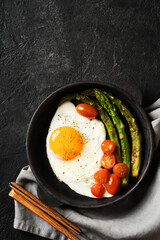 Healthy Breakfast with Egg, Asparagus and Tomatoes