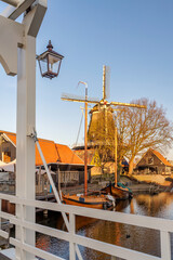 View at the historic harbor with windmill of the Dutch city of Harderwijk