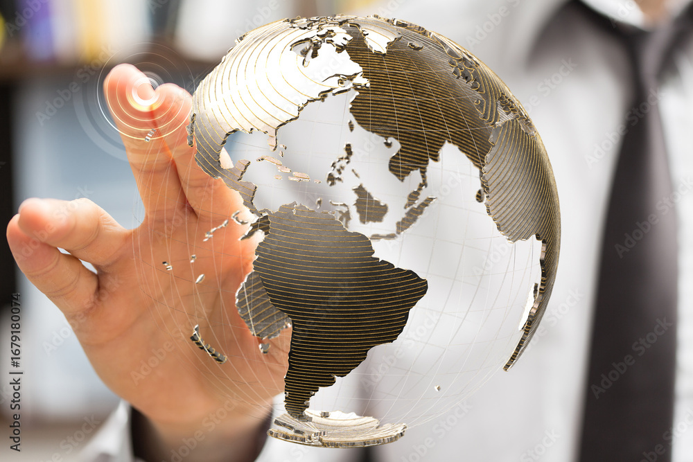 Poster hand interacting with a digital globe, symbolizing global reach and networking.