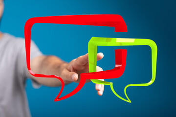 Abstract image of hand interacting with 3D speech bubbles.  Ideal for communication, conversation,...