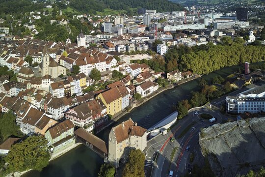View of the old town with the parish church of Maria Himmelfahrt, in the background the ruins of Stein Castle, formerly an administrative centre of the Habsburgs, on the right the river Limmat and the covered wooden bridge with the Landvogteischloss, Baden, Canton, Aargau, Switzerland