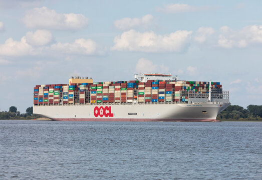 Stade, Germany &ndash; August 26, 2025: Container ship OOCL VALENCIA on Elbe river heading to Hamburg.