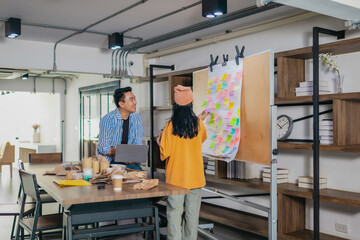 Fototapeta premium Startup Team Planning Product Development with Agile Task Board