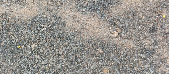Rough Asphalt Gravel Road Surface Texture with Small Stones and Dust