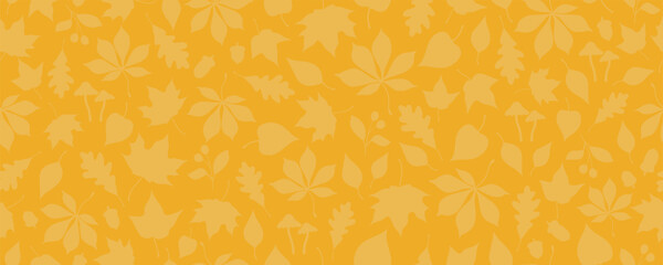 Seamless pattern with autumn leaves, acorns, berries and mushrooms on yellow background. Repeated seasonal texture. Autumn season and thanksgiving celebration banner