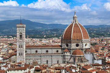 Obraz premium The Duomo and Giotto's Bell Tower Dominating Florence's Skyline. A classic panoramic 