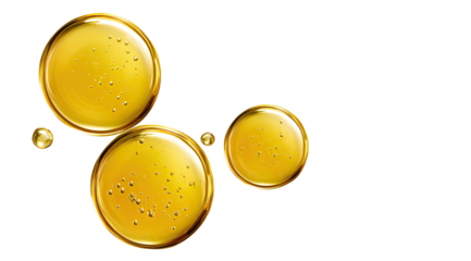 Golden oil droplets,  smooth,  and  reflective.  Close-up  view