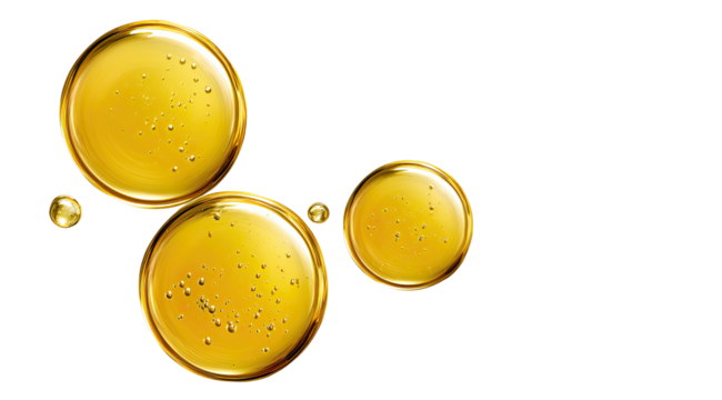 Golden oil droplets,  smooth,  and  reflective.  Close-up  view