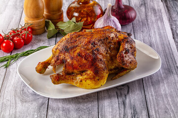 Hot tasty grilled whole chicken