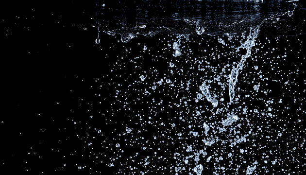 water splash in a black background with many design can use