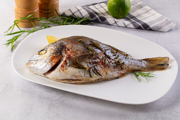 Baked dorada fish with spices