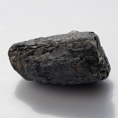 Natural Black Tourmaline Crystal Stone, Raw Mineral Specimen, Dark Grey Textured Rock, Geology, Metaphysical Healing, Shadow, Studio Shot