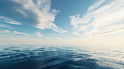 Obraz premium Calm Sea Under Blue Sky and White Clouds, Suitable for Natural Scenery, Ocean Landscape, Vacation Background and Other Scenarios