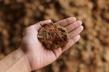 a pile of brown lumps of barren clay, brown soil, red soil