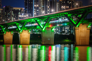 The splendid night view of Cheongdam Bridge on the Han River in Seoul, South Korea, with the subway passing over it.