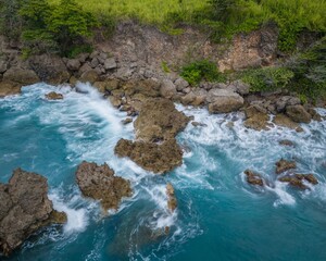 Rocky Coastline with Turquoise Waves