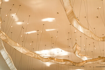 A unique modern warm light ceiling lamp shape