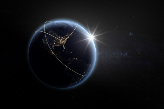 Earth at night from space with light lines of communication, connection or travel. Global communications system and the World Wide Web.