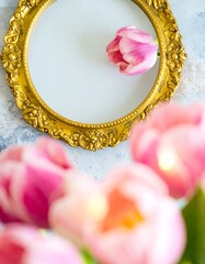 Pink tulip in gold frame
