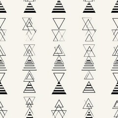 Obraz premium Geometric Black and White Triangle Pattern on Cream Background, Minimalist Design.