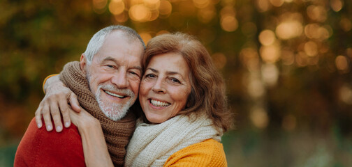 Banner of senior couple in autumn nature.