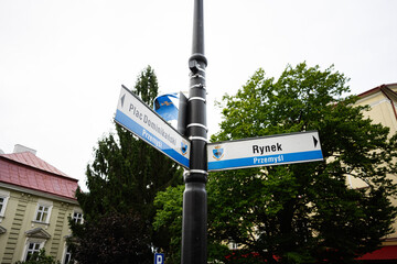 Street signs indicating directions in Przemysl, Poland on a sunny day