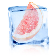Piece of fresh grapefruit inside ice cube on white background