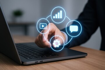 Man Interacting with Digital Interface on Laptop Displaying Business and Social Media Icons
