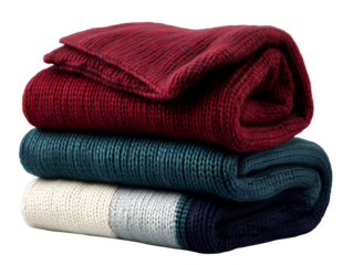sweater blanket, stack of three different colors, isolated on a transparent background.
