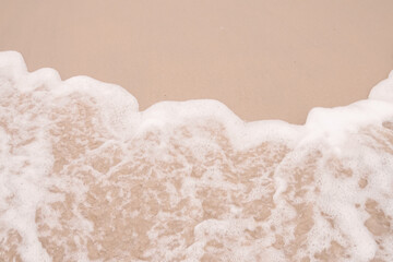 Ocean waves on a sandy beach