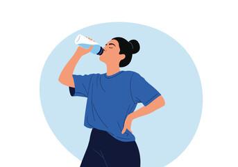 Woman drinking water from a bottle staying hydrated during her workout routine