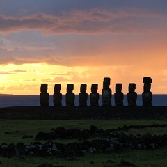 Sunrise silhouettes of Moai statues